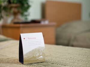 A welcome card tent in a Semi-private room at Bishop Care