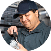 maintenance man holding a screwdriver